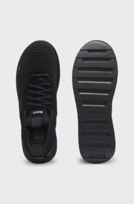 Sneakers med strikket overdel og ruskindsdetaljer, Sort