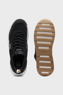 Sneakers med strikket overdel og ruskindsdetaljer, Sort