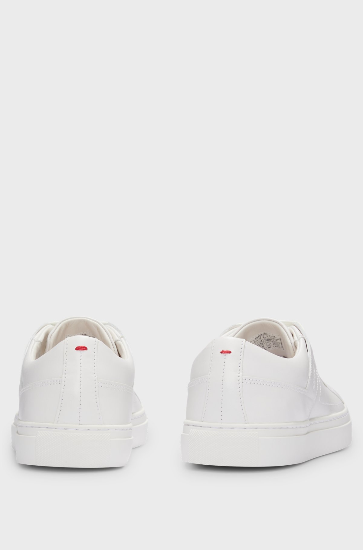 Lace-up trainers in leather with subtle branding, White