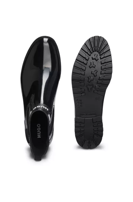 Bottes de pluie Chelsea en matière brillante avec patch logo