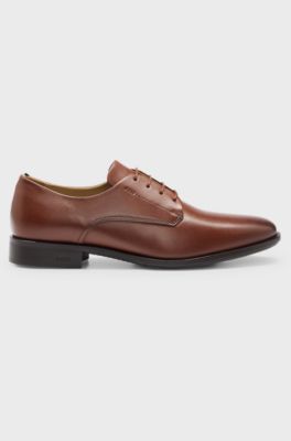 Chaussures derby en cuir avec finitions embl&eacute;matiques, Marron