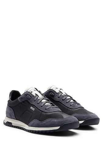 Low-top trainers in mixed materials with washed effect, Black