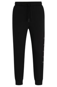 Cotton-blend tracksuit bottoms with embossed logo, Black