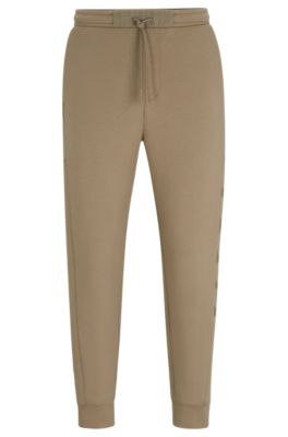 BOSS - Cotton-blend tracksuit bottoms with embossed logo