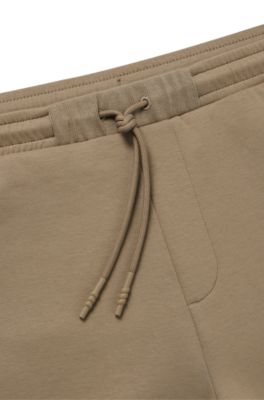BOSS - Cotton-blend tracksuit bottoms with embossed logo