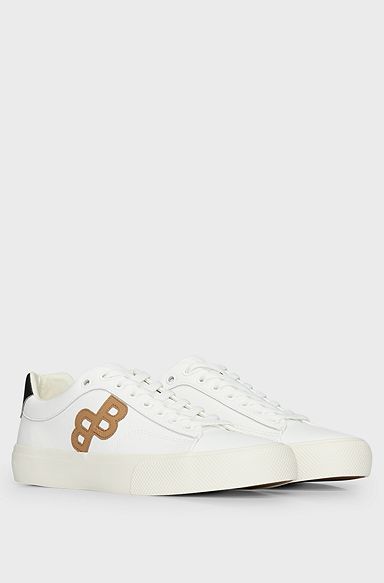Low-top trainers with monogram detail, White