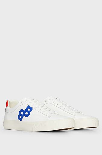 Low-top trainers with monogram detail, White