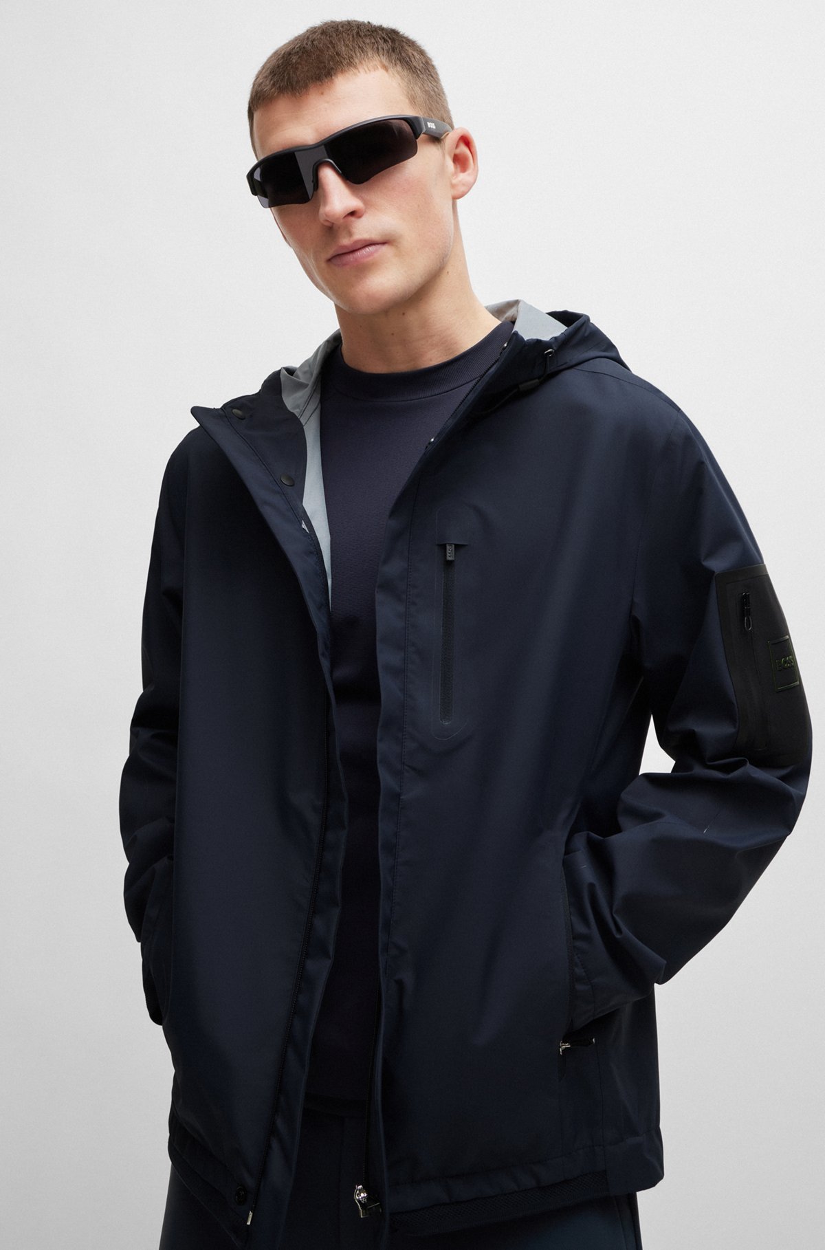 Water-repellent hooded jacket with debossed details, Dark Blue