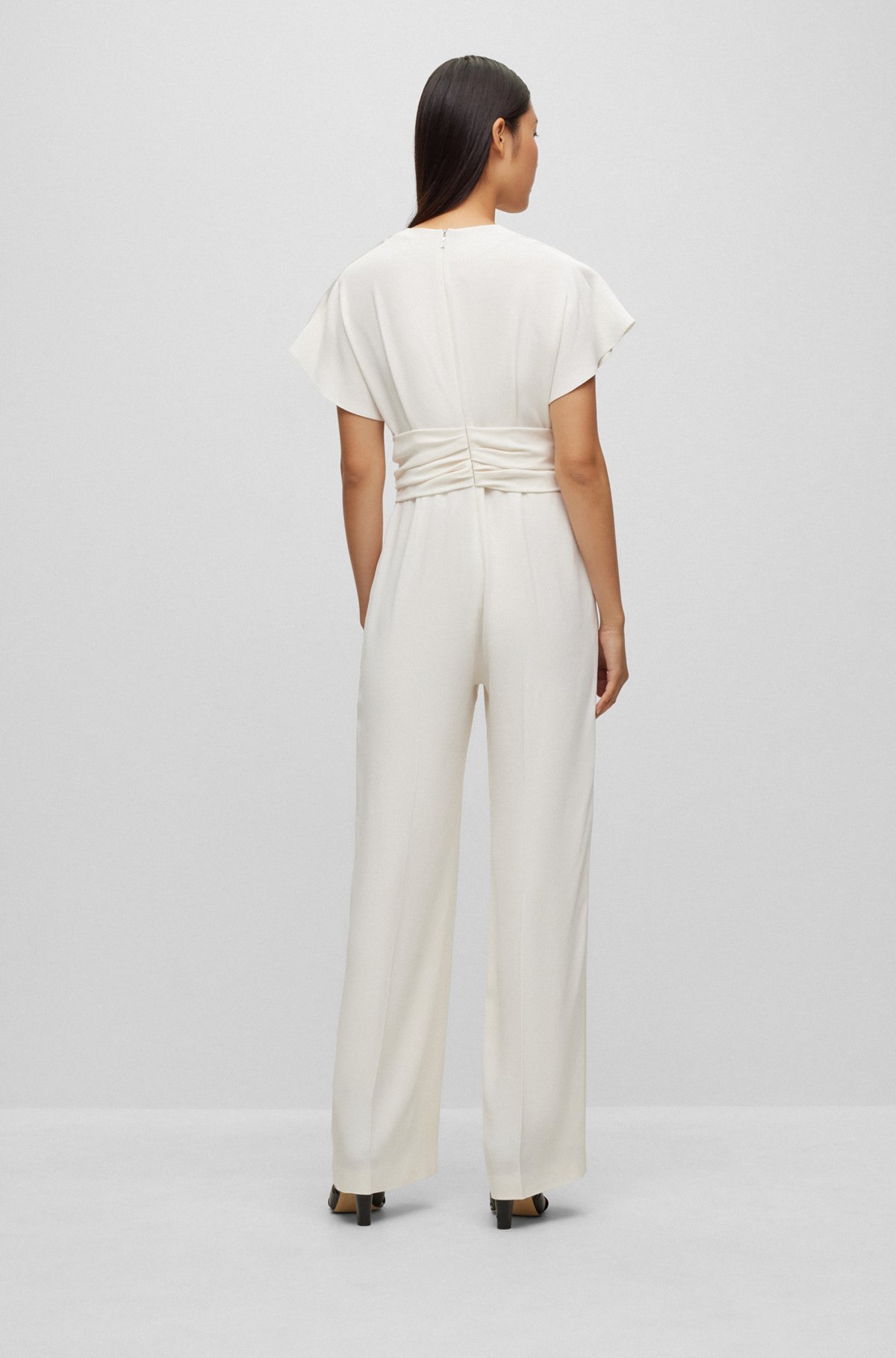 Slim-fit jumpsuit with wrap front, White
