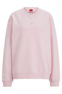 Relaxed-fit sweatshirt with embossed stacked logo, light pink