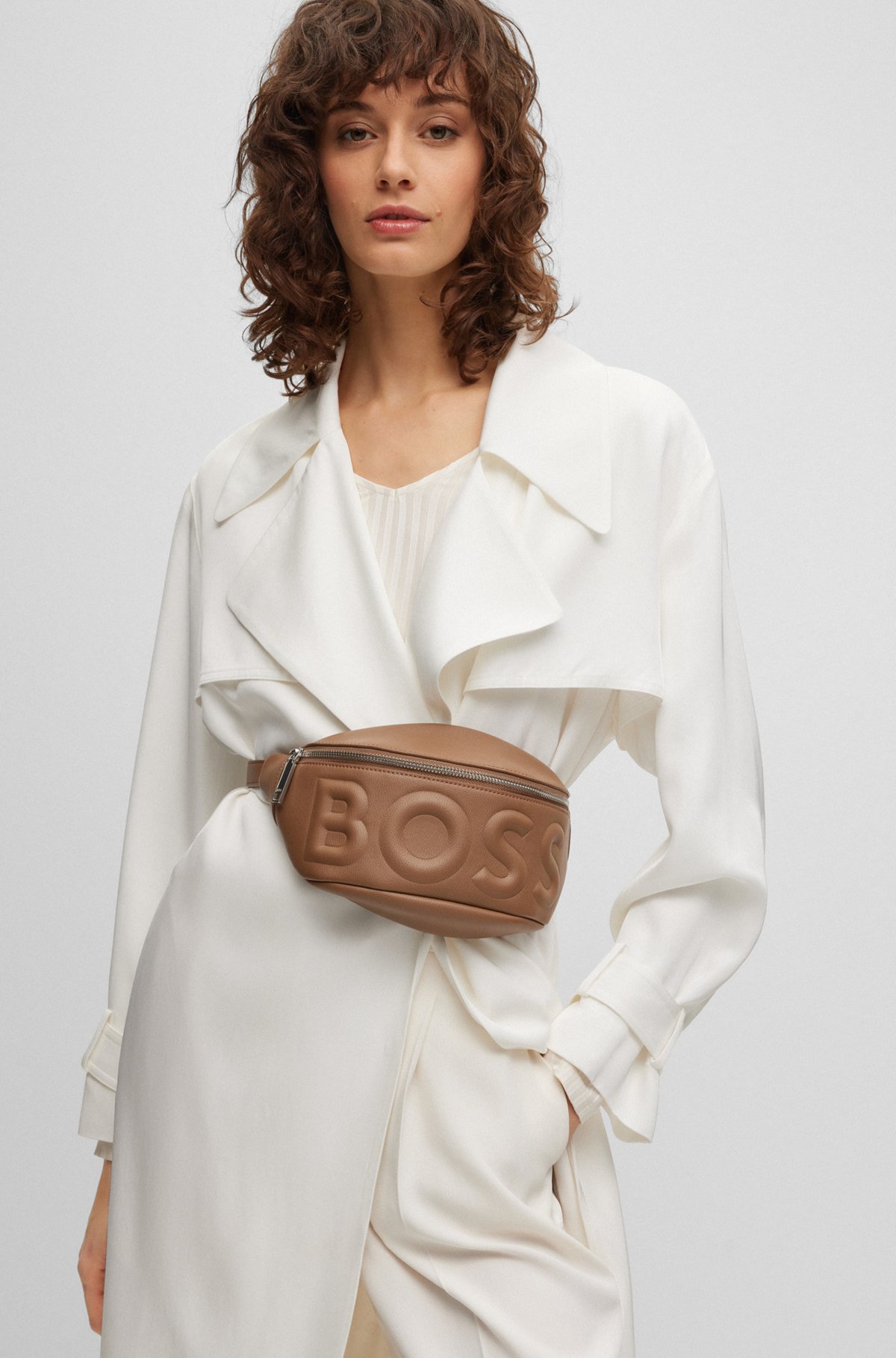 Belt bag in faux leather with debossed logo, Beige