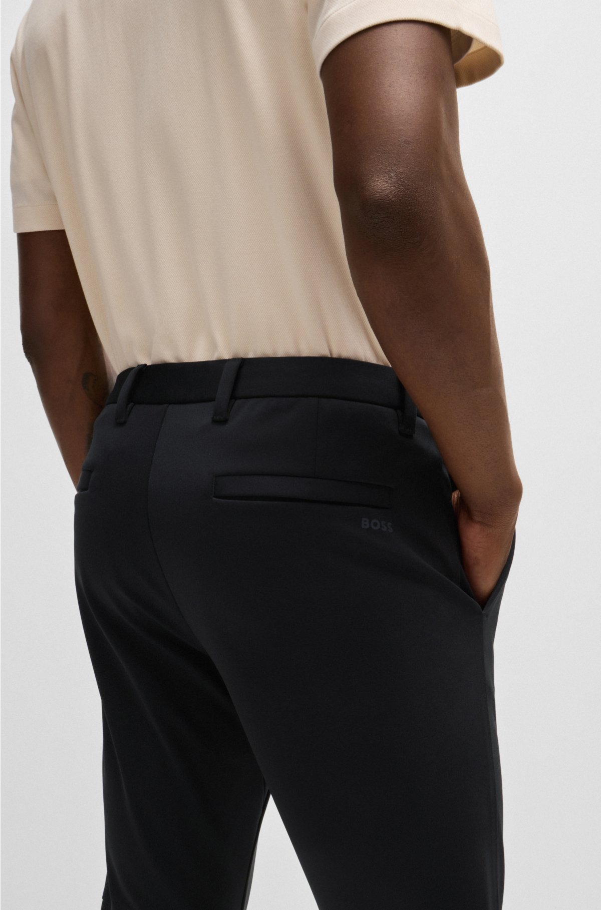 Slim-fit trousers in waterproof softshell material, Black