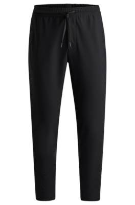 Hugo Boss Tapered-fit Trousers In Waterproof Softshell Material In Black