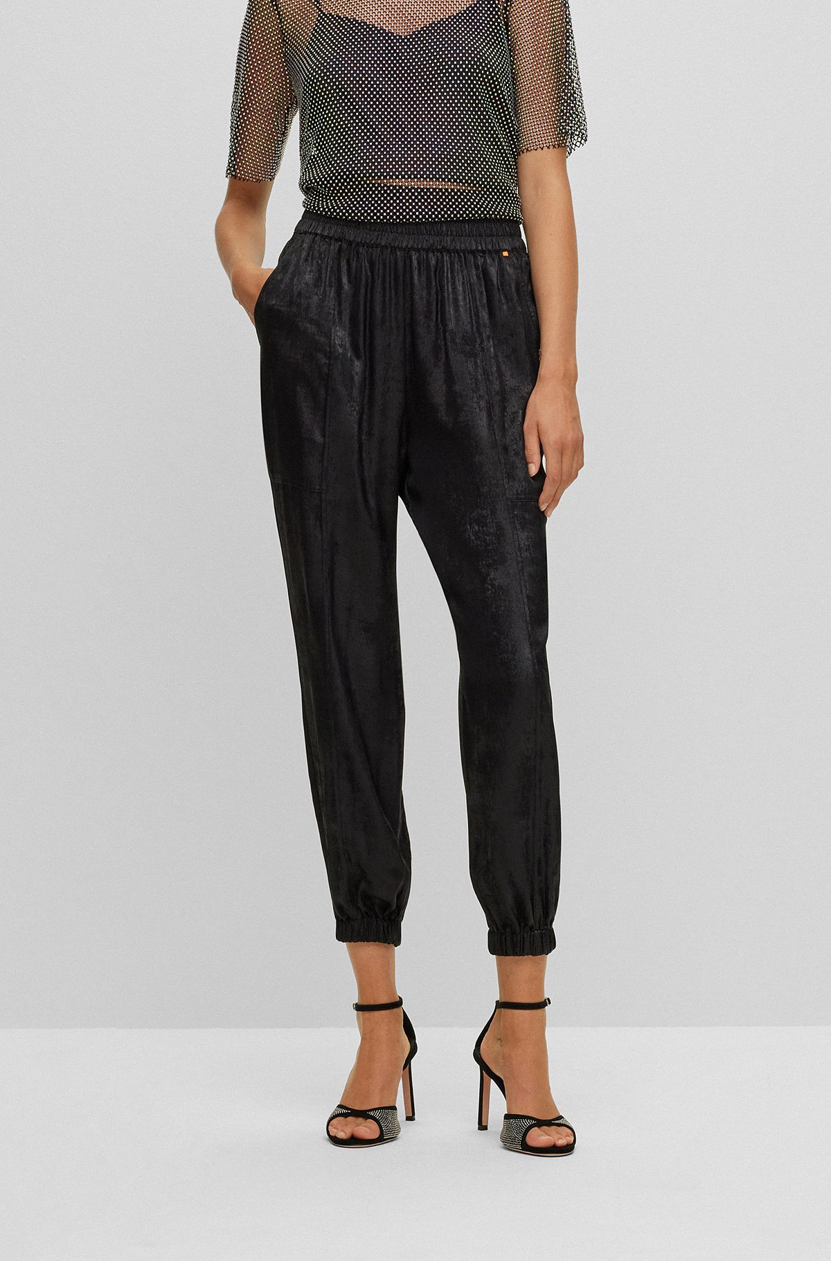 Baggy-fit broek met print in metallic-look, Zwart