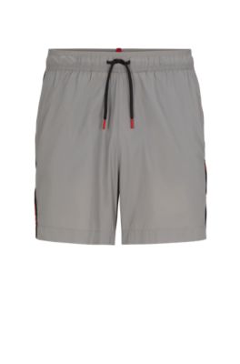 HUGO - Fully lined swim shorts with logo tape