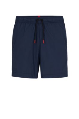 HUGO - Fully lined swim shorts with logo tape