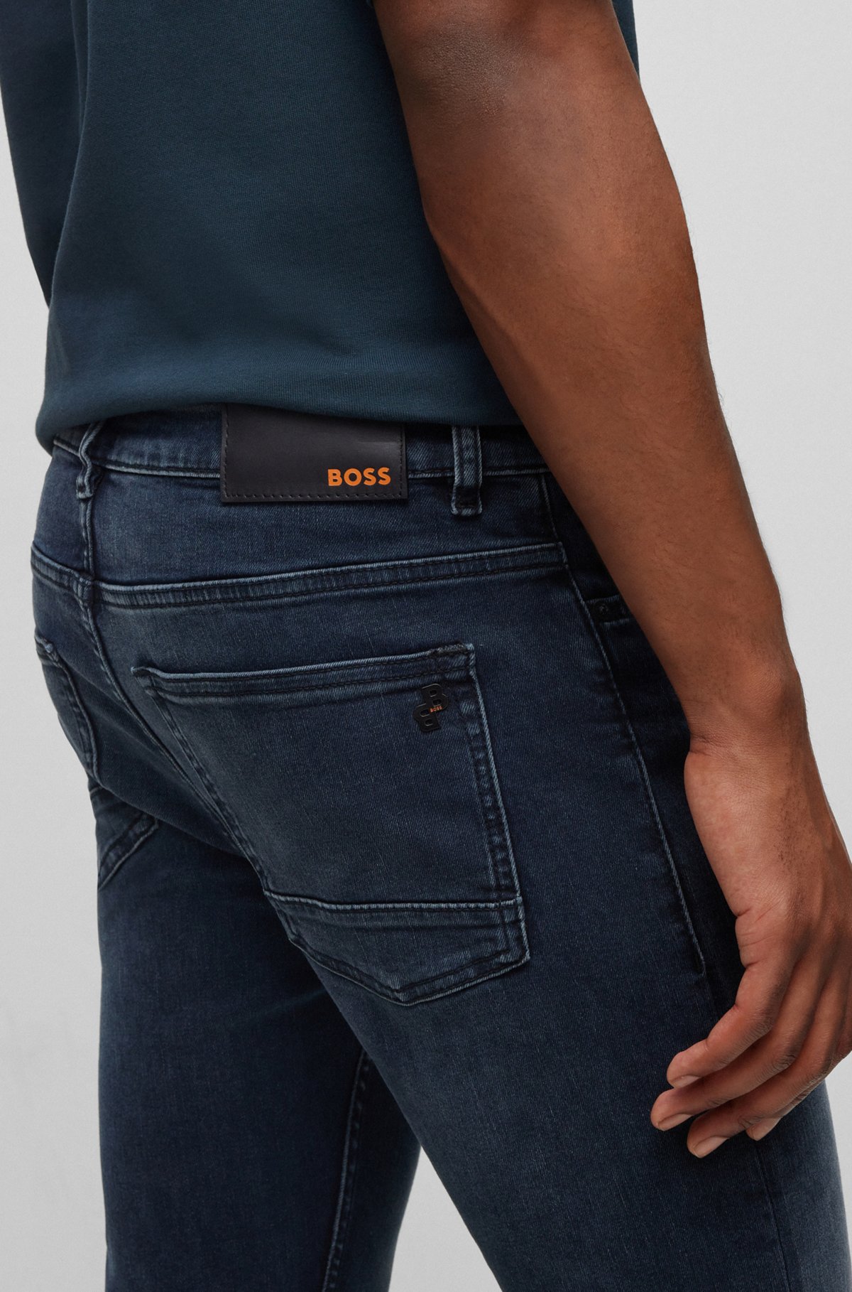 BOSS - Slim-fit jeans in dark-blue super-stretch denim