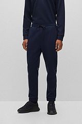 Relaxed-fit tracksuit bottoms with mirror-effect logo, Dark Blue