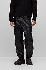 Cuffed regular-fit cargo trousers in faux leather, Black