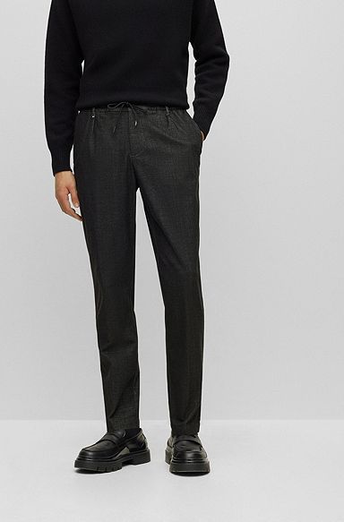 Relaxed-fit trousers in stretch material with drawcord waistband, Black