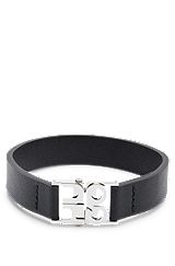 Leather cuff with stacked-logo hardware closure, Black