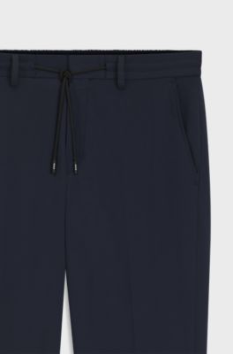 Pantaloni slim fit in jersey elasticizzato ad alte prestazioni, Blu scuro