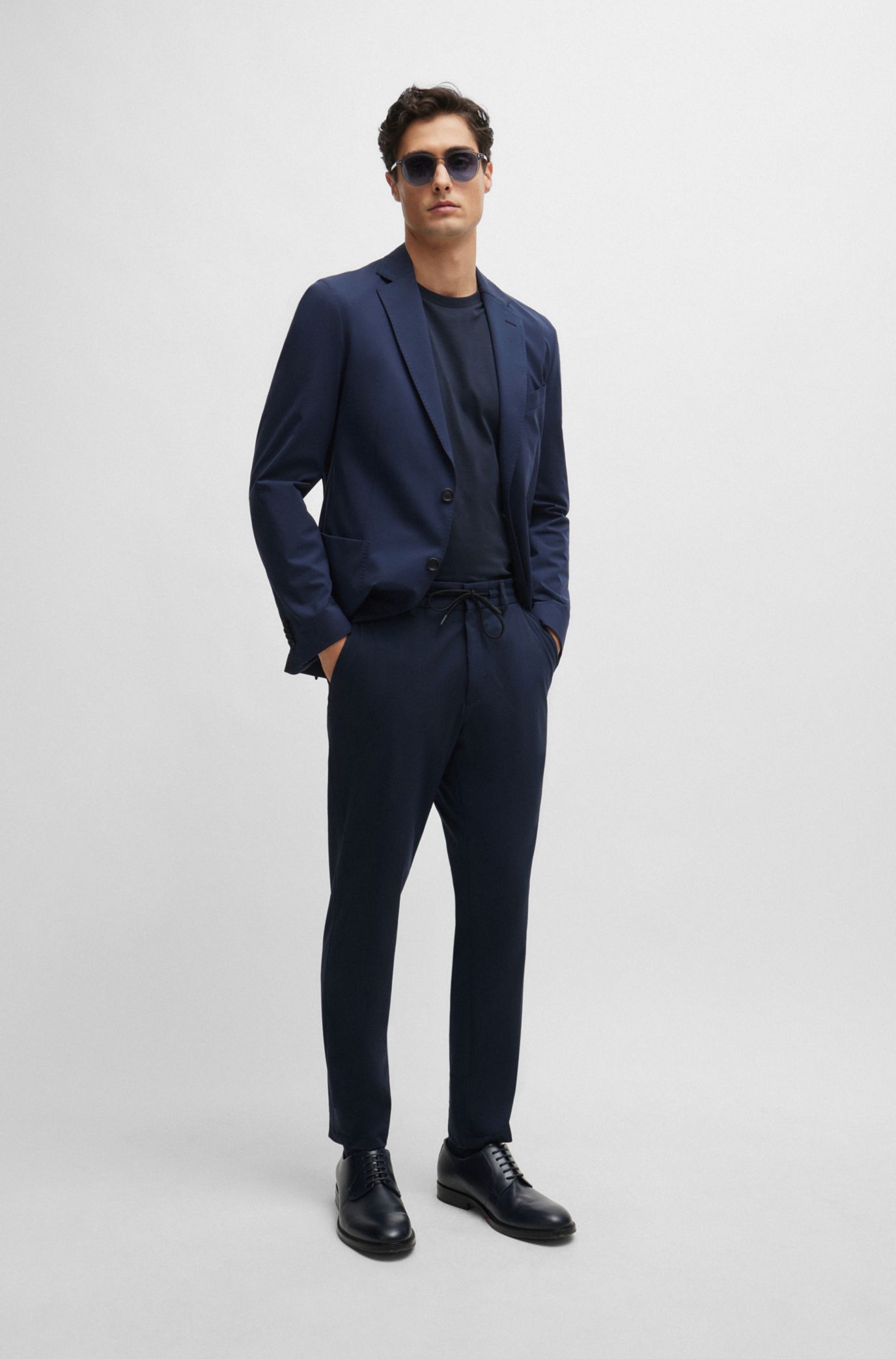BOSS - Slim-fit trousers in performance-stretch jersey