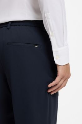 Pantaloni slim fit in jersey elasticizzato ad alte prestazioni, Blu scuro