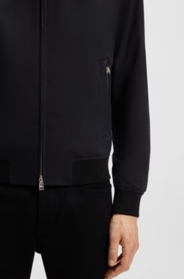 Slim-fit jasje van hoogwaardige stretchjersey, Zwart