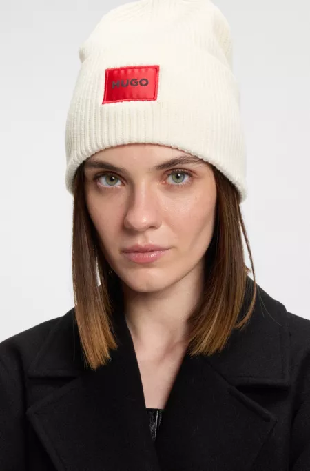 Wool-blend beanie hat with red logo patch