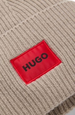 M&ouml;ssa i ullblandning med r&ouml;tt logo-m&auml;rke, Ljusbeige