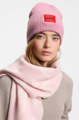 Wool-blend beanie hat with red logo patch, light pink