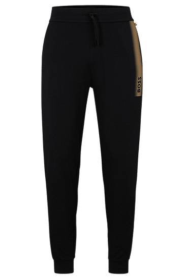 Cotton-terry tracksuit bottoms with logo and stripe, Hugo boss