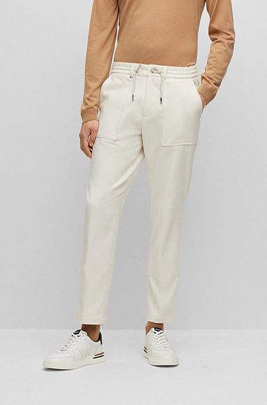 Relaxed-fit trousers with micro pattern and drawcord waist, White