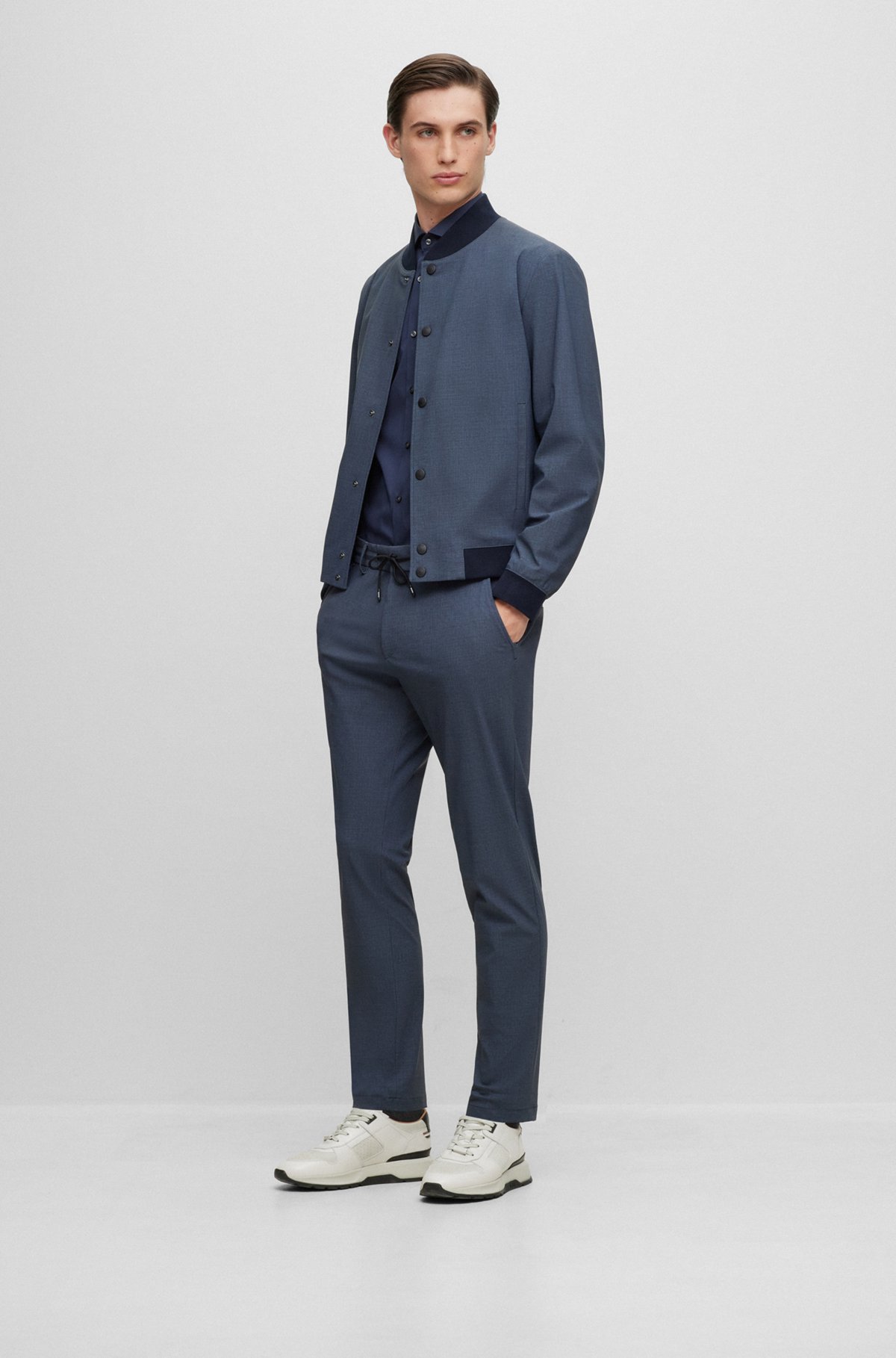 Slim-fit trousers in micro-patterned performance-stretch jersey, Dark Blue