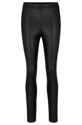 Skinny-fit high-waisted trousers with side zip 1