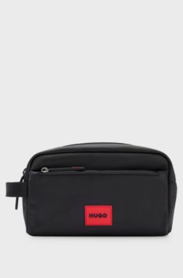 Washbag in structured fabric with red logo label, Black