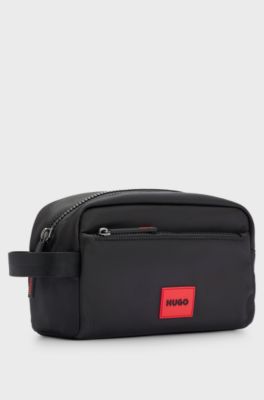 Washbag in structured fabric with red logo label, Black