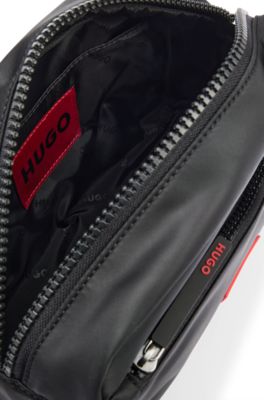 Washbag in structured fabric with red logo label, Black