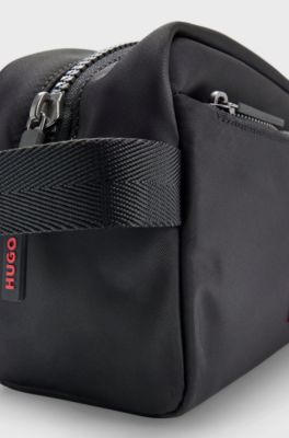 Washbag in structured fabric with red logo label, Black