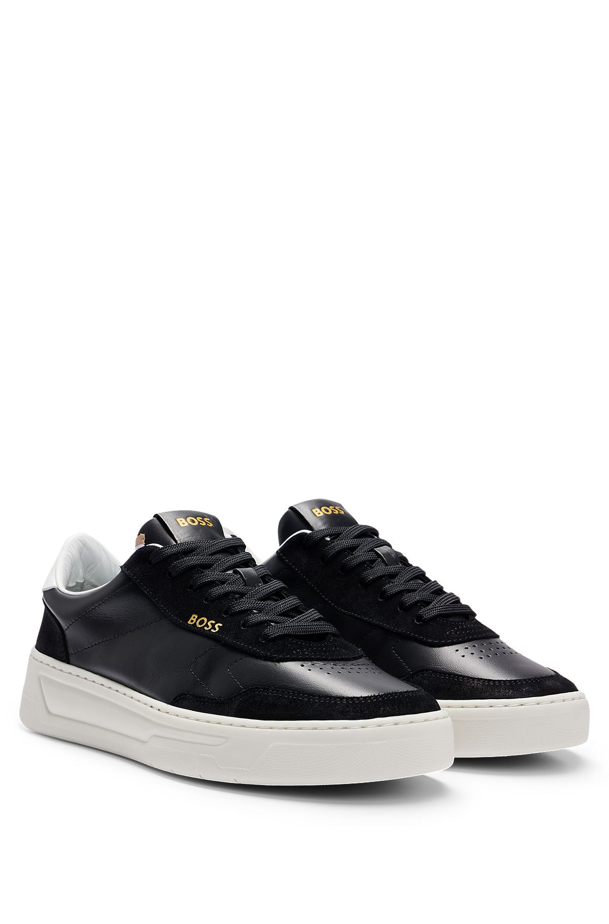 Low-top trainers in leather and suede, Black
