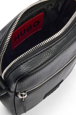 Faux-leather reporter bag with rubberised logo patch, Black