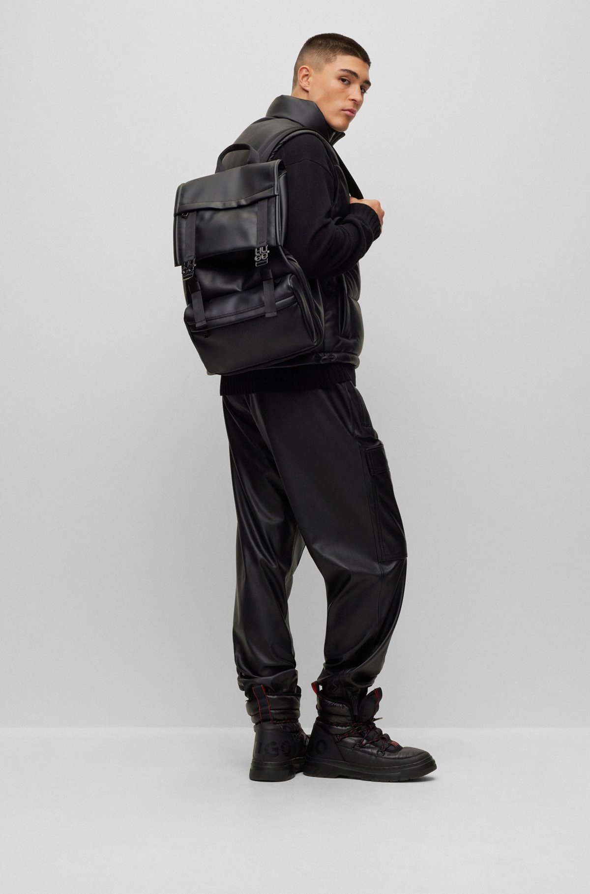 Flap-closure backpack with stacked-logo buckles, Black