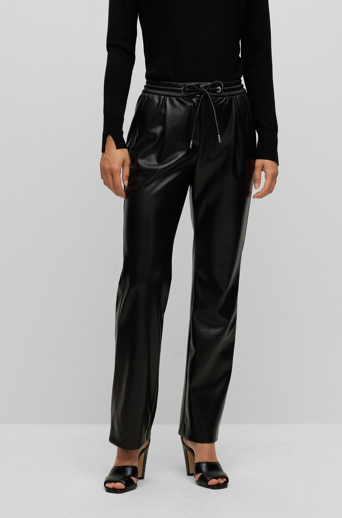 Relaxed-fit high-waisted trousers in coated material, Black