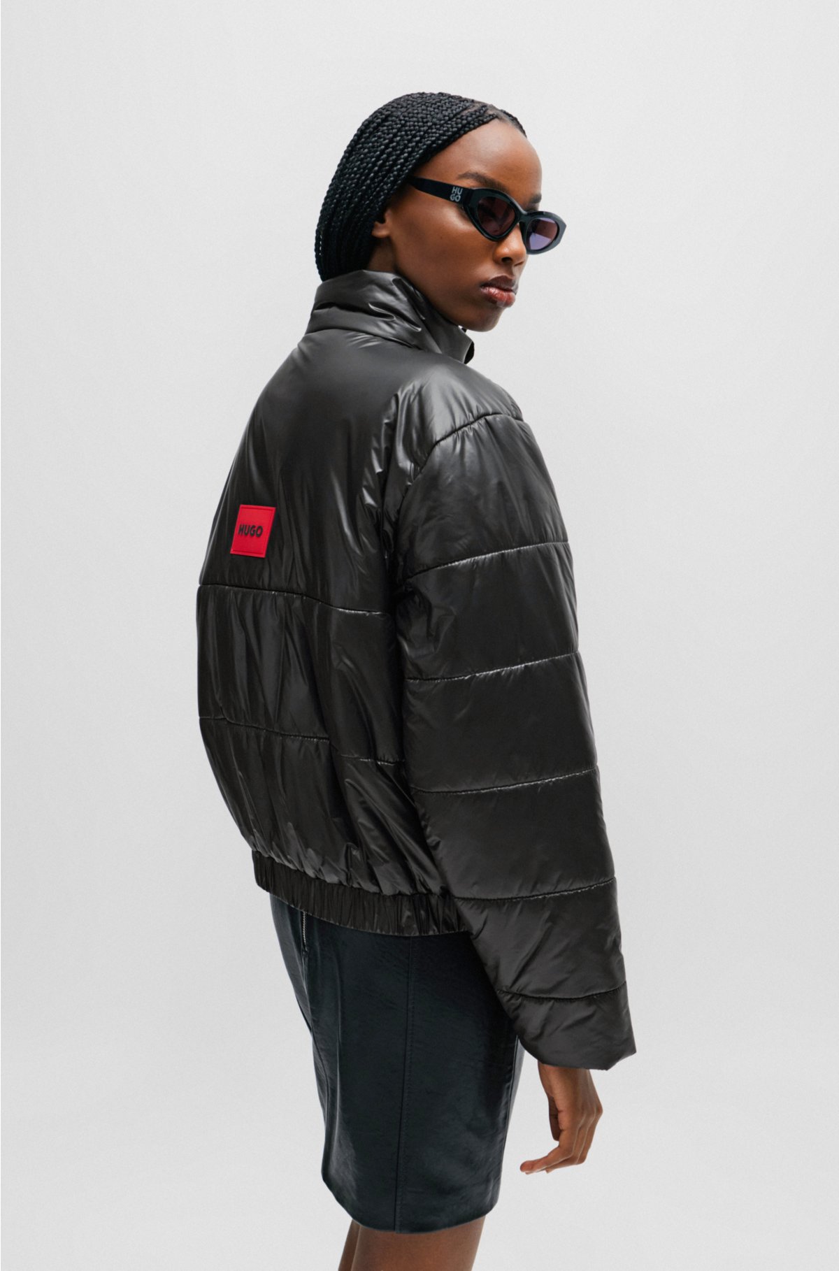 Relaxed-fit water-repellent jacket with red logo label, Black