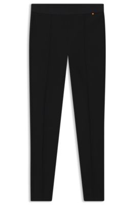 Byxor i extra slim fit och s&ouml;m framtill, Svart