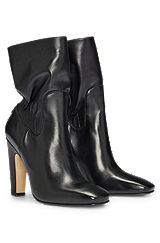 High-heeled boots in nappa leather with monogram trim, Black
