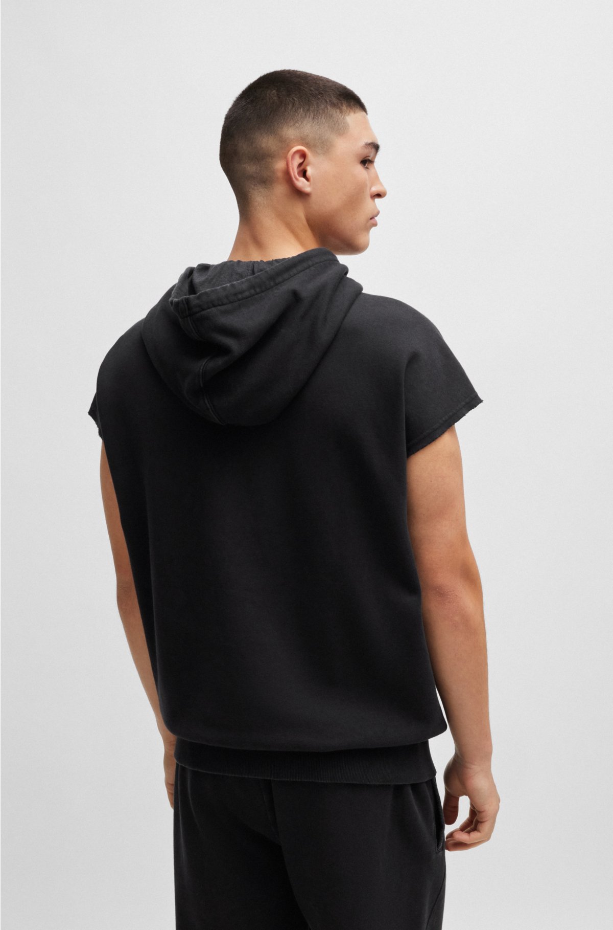 Sleeveless cotton hoodie with stud-effect artwork, Black