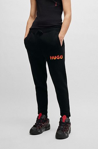 Cotton-terry tracksuit bottoms with puffed flame logo, Black