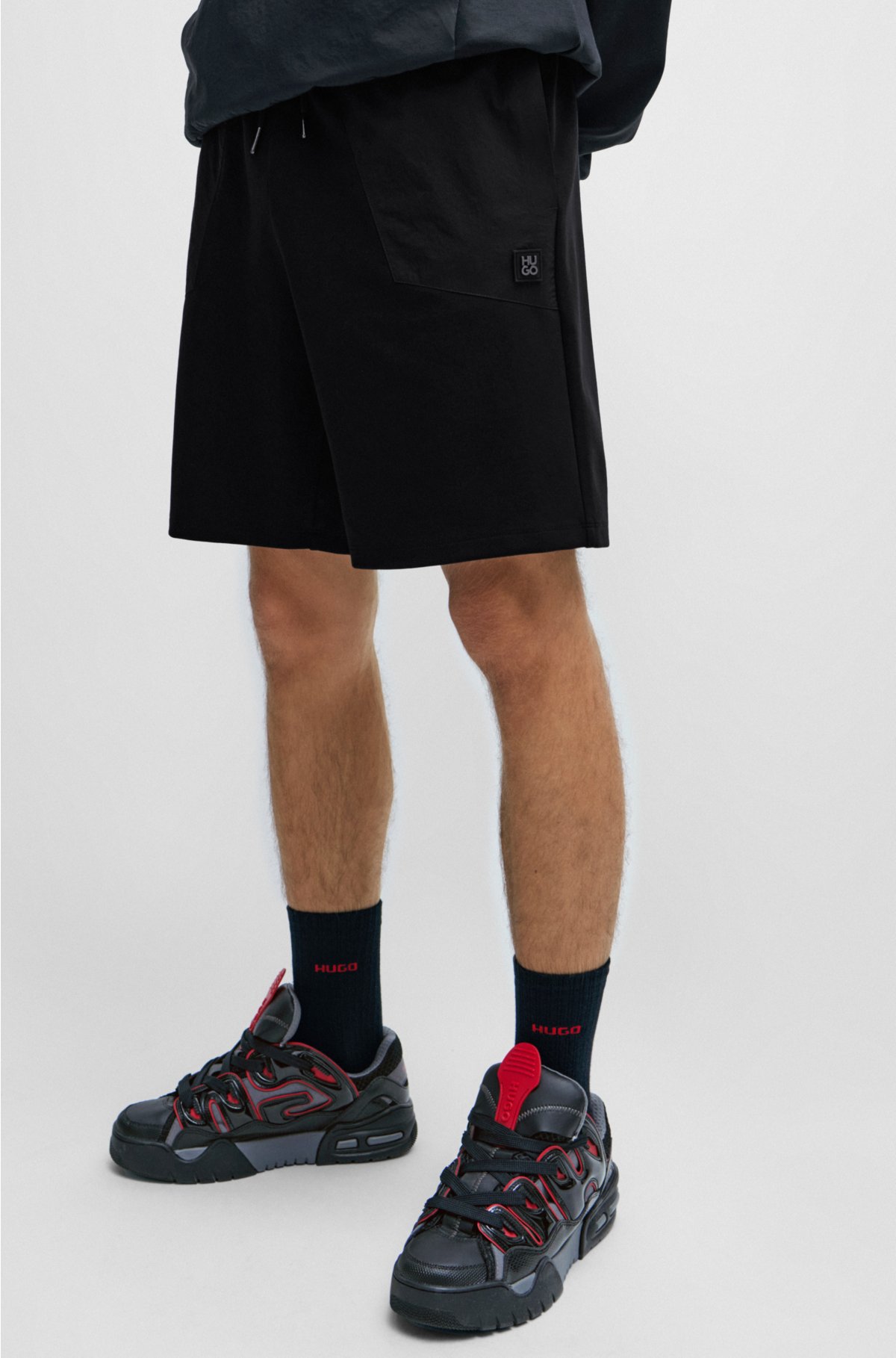 Relaxed-fit shorts in stretch cotton with contrast pockets, Black